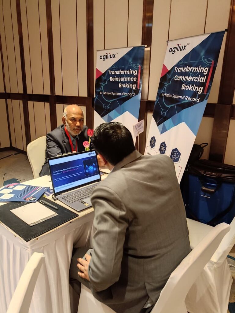 Discussions on AI-native insurance infrastructure at Agiliux booth